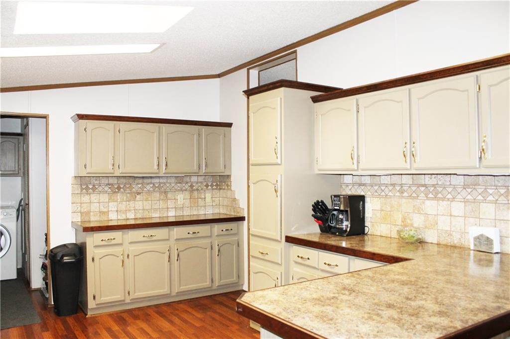 1045 Stickle Road Portersville, PA 16051 - Photo 6 of 25 The decorative backsplash really ties the room together...
