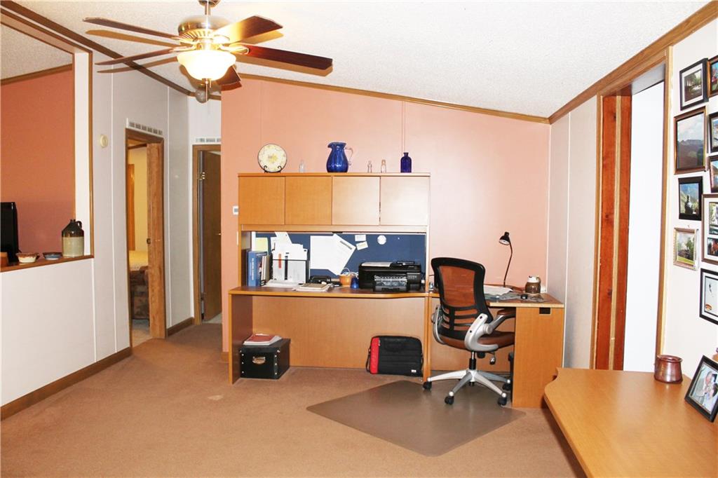 1045 Stickle Road Portersville, PA 16051 - Photo 10 of 25 The family room can easily be used as an office...