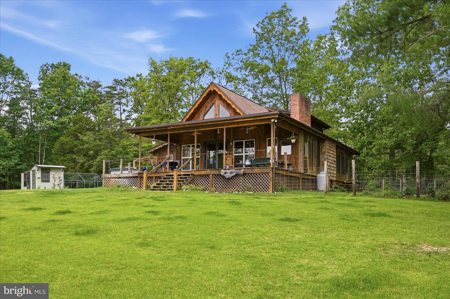14636 Turner Road Fulks Run, VA 22830 - Photo 53 of 87 Charming cabin nestled in lush greenery.