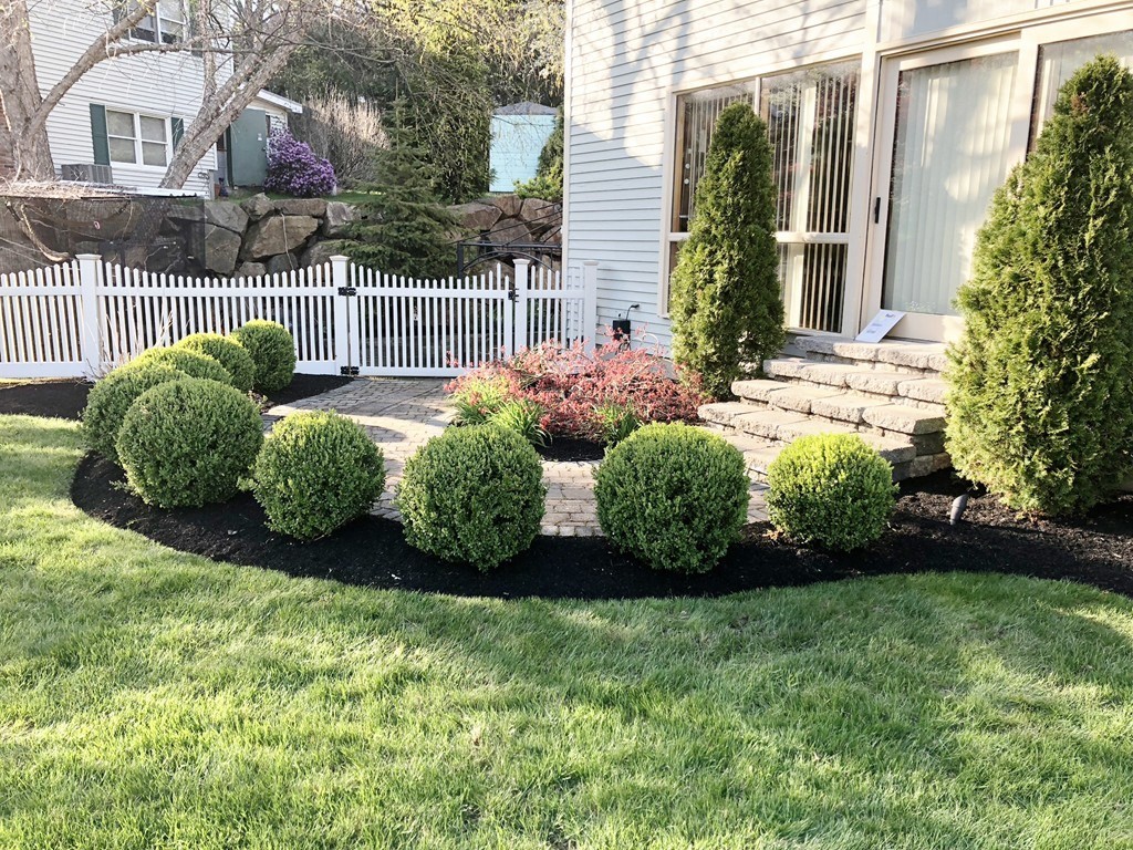 5 Clipper Way Beverly, MA 01915 - Photo 3 of 42 a view of a house with a garden