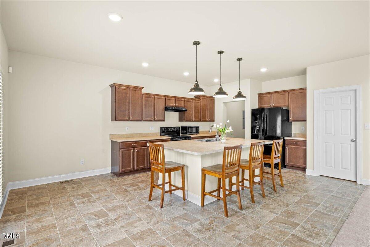 704 Haw River Hopedale Road Burlington, NC 27217 - Photo 15 of 49 Kitchen/Dining