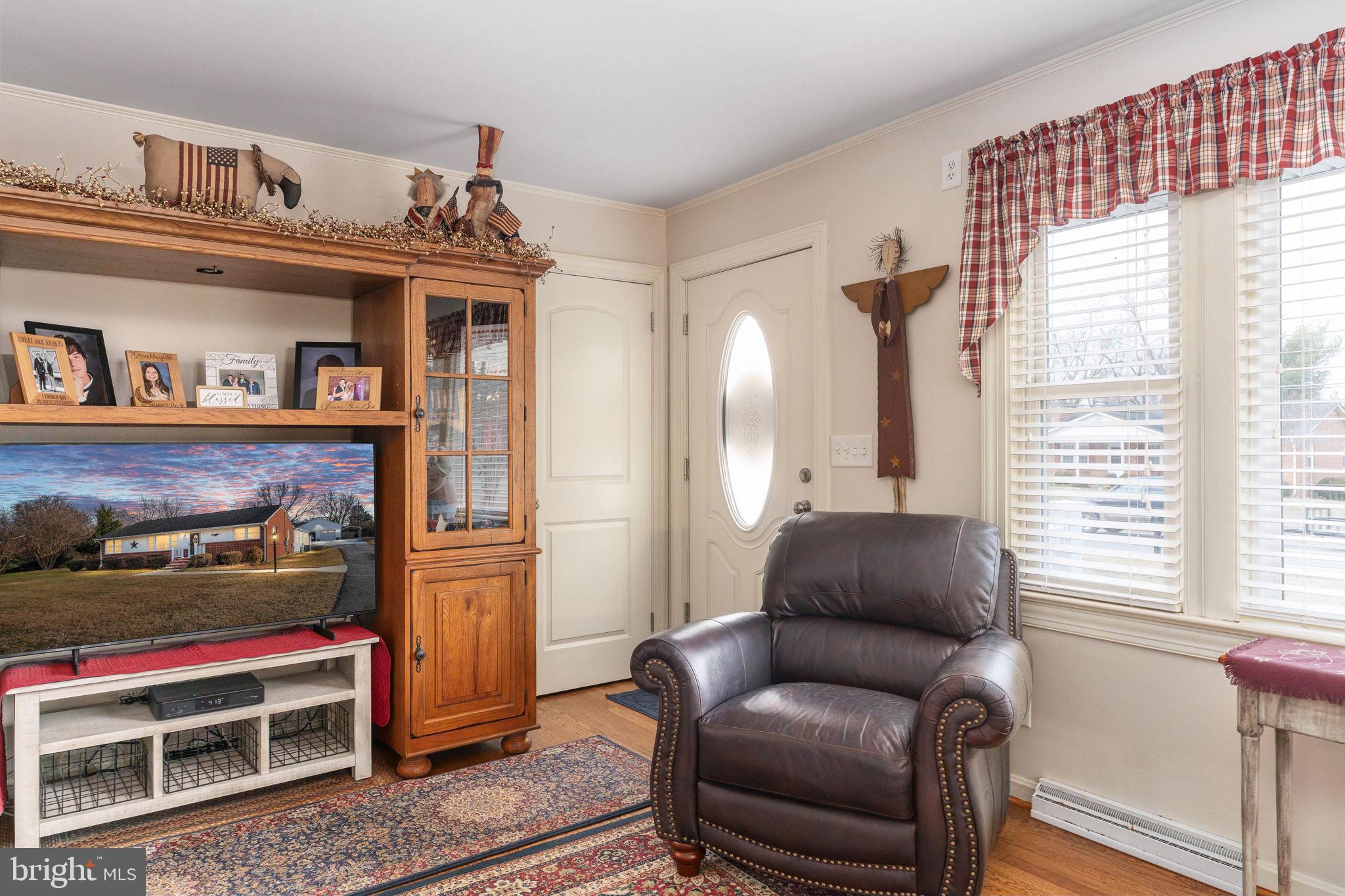 511 Ferry Road Fredericksburg, VA 22405 - Photo 13 of 55 a living room with furniture and a window