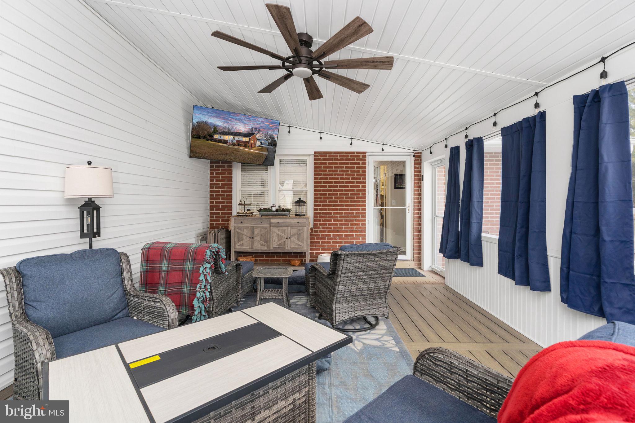 511 Ferry Road Fredericksburg, VA 22405 - Photo 14 of 55 a living room with furniture kitchen view and a chandelier