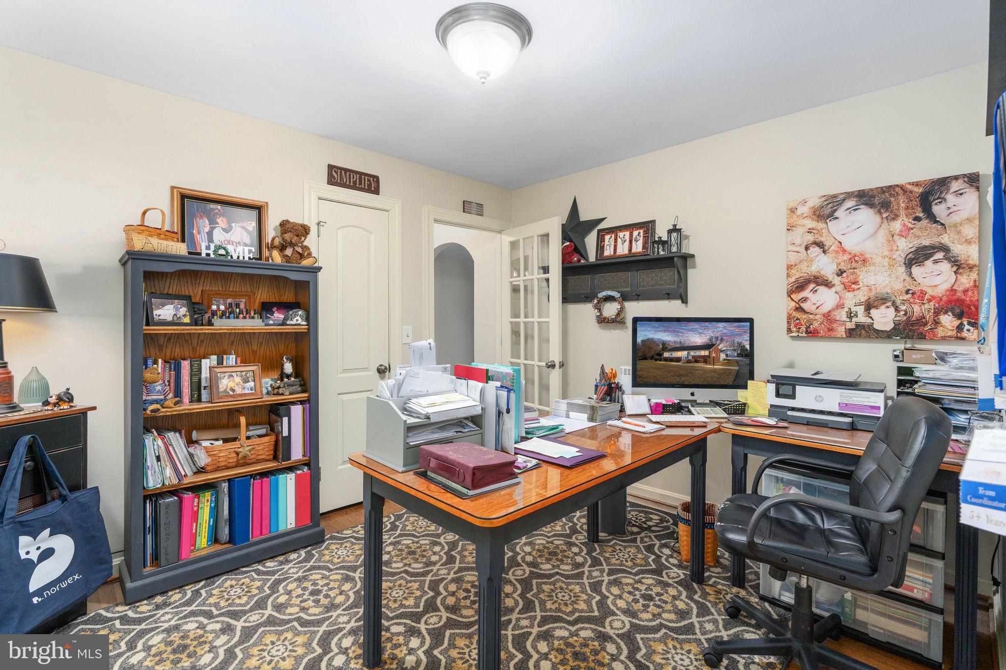 511 Ferry Road Fredericksburg, VA 22405 - Photo 17 of 55 a reading room with furniture and a book shelf