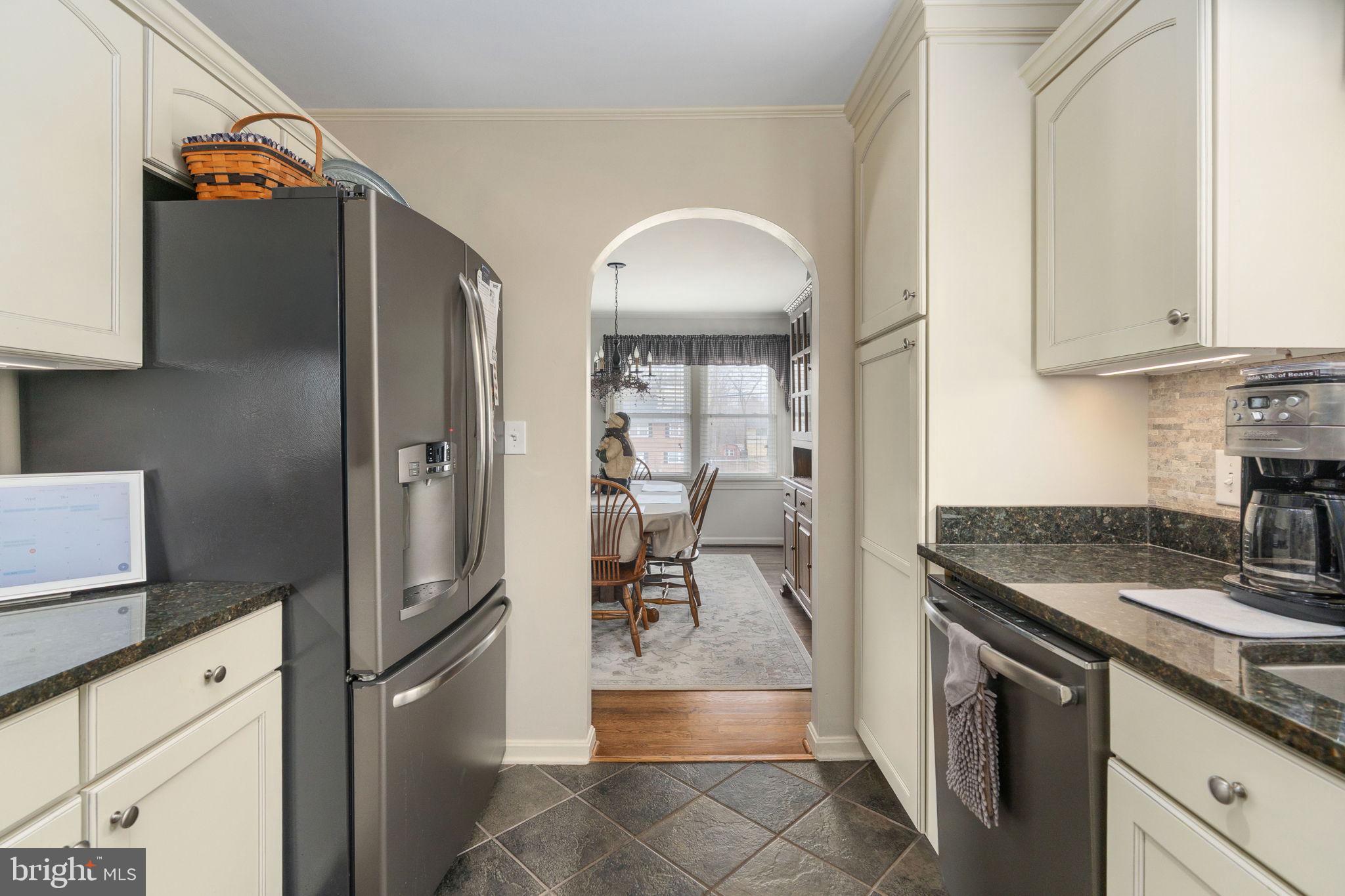 511 Ferry Road Fredericksburg, VA 22405 - Photo 20 of 55 a kitchen with stainless steel appliances granite countertop a refrigerator and a sink