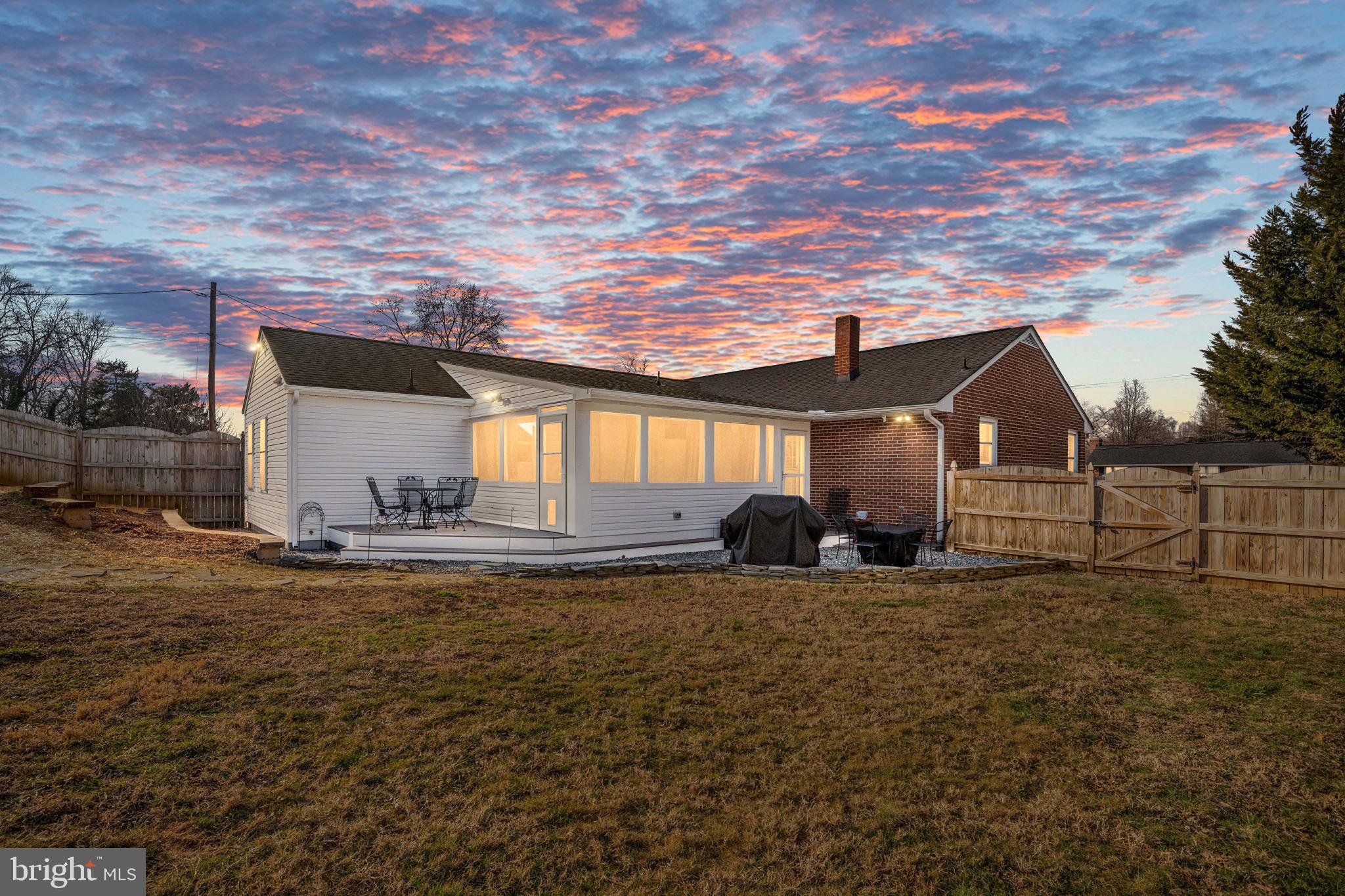 511 Ferry Road Fredericksburg, VA 22405 - Photo 2 of 55 a view of a house with backyard and sitting area