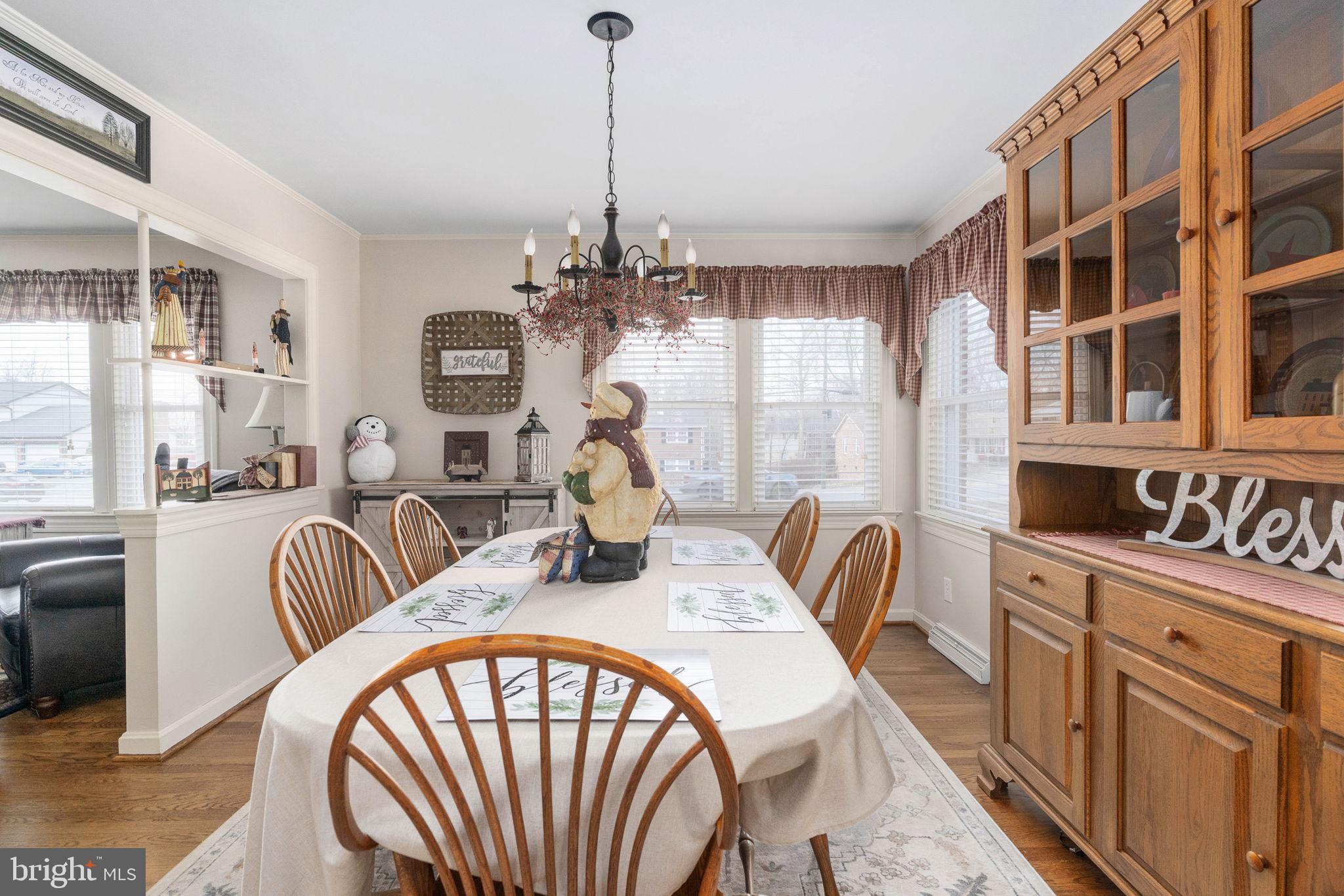 511 Ferry Road Fredericksburg, VA 22405 - Photo 24 of 55 a dining room with furniture a chandelier and window