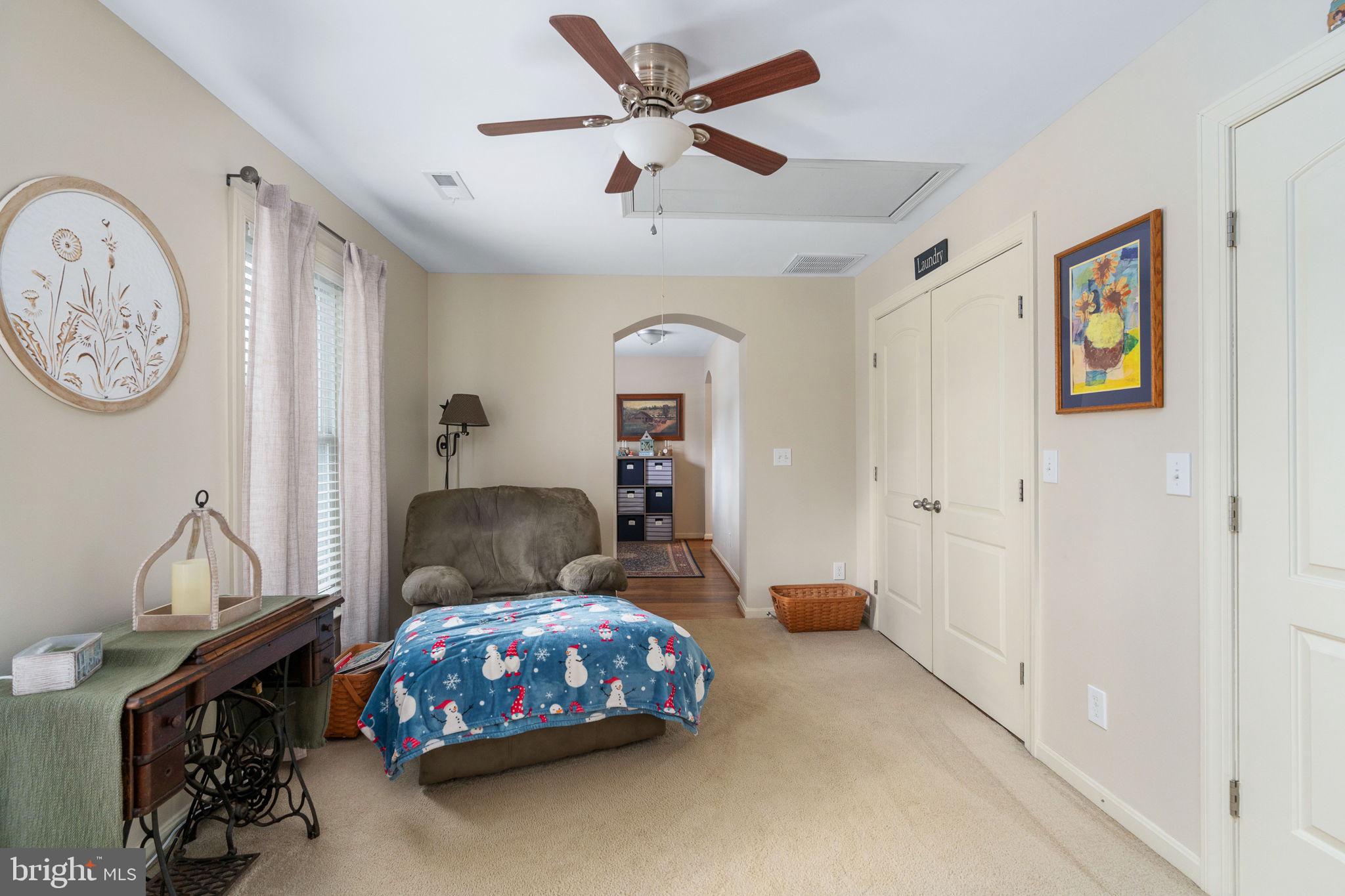 511 Ferry Road Fredericksburg, VA 22405 - Photo 33 of 55 a bedroom with a bed and wooden floor