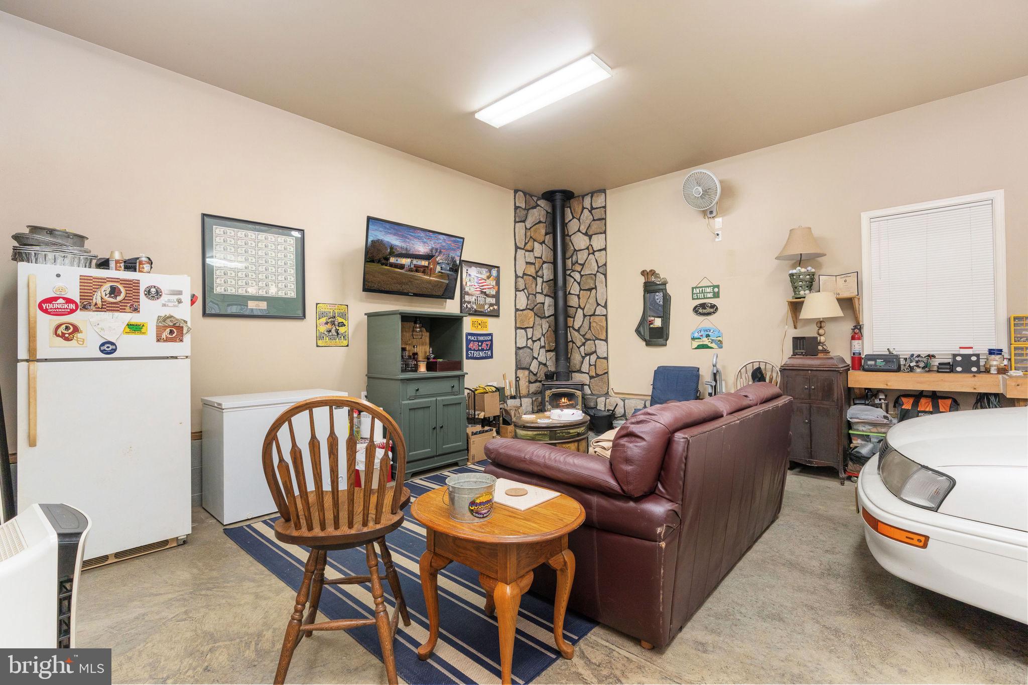 511 Ferry Road Fredericksburg, VA 22405 - Photo 44 of 55 a living room with furniture and a wooden floor