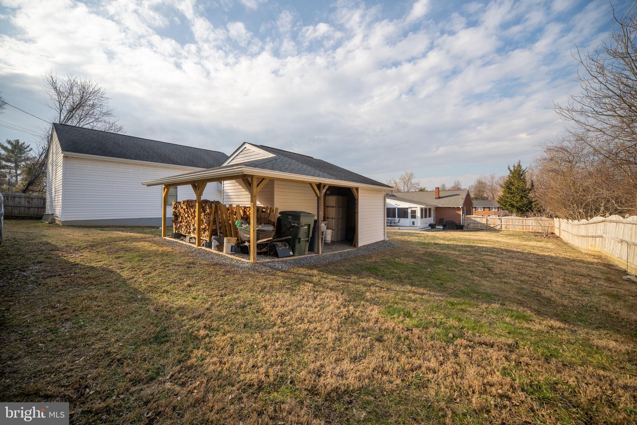 511 Ferry Road Fredericksburg, VA 22405 - Photo 49 of 55 a view of an house with backyard and bushes