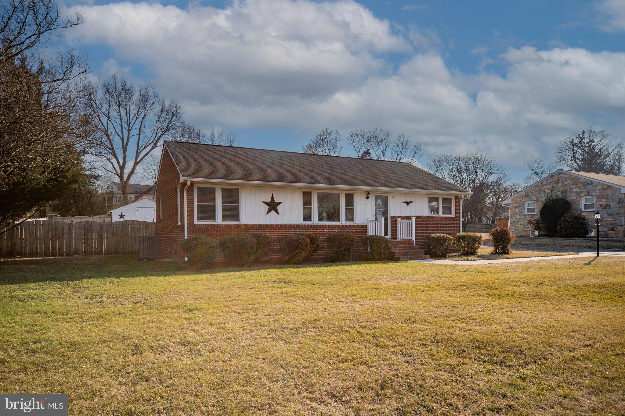 511 Ferry Road Fredericksburg, VA 22405 - Photo 5 of 55 a front view of house with yard and swimming pool