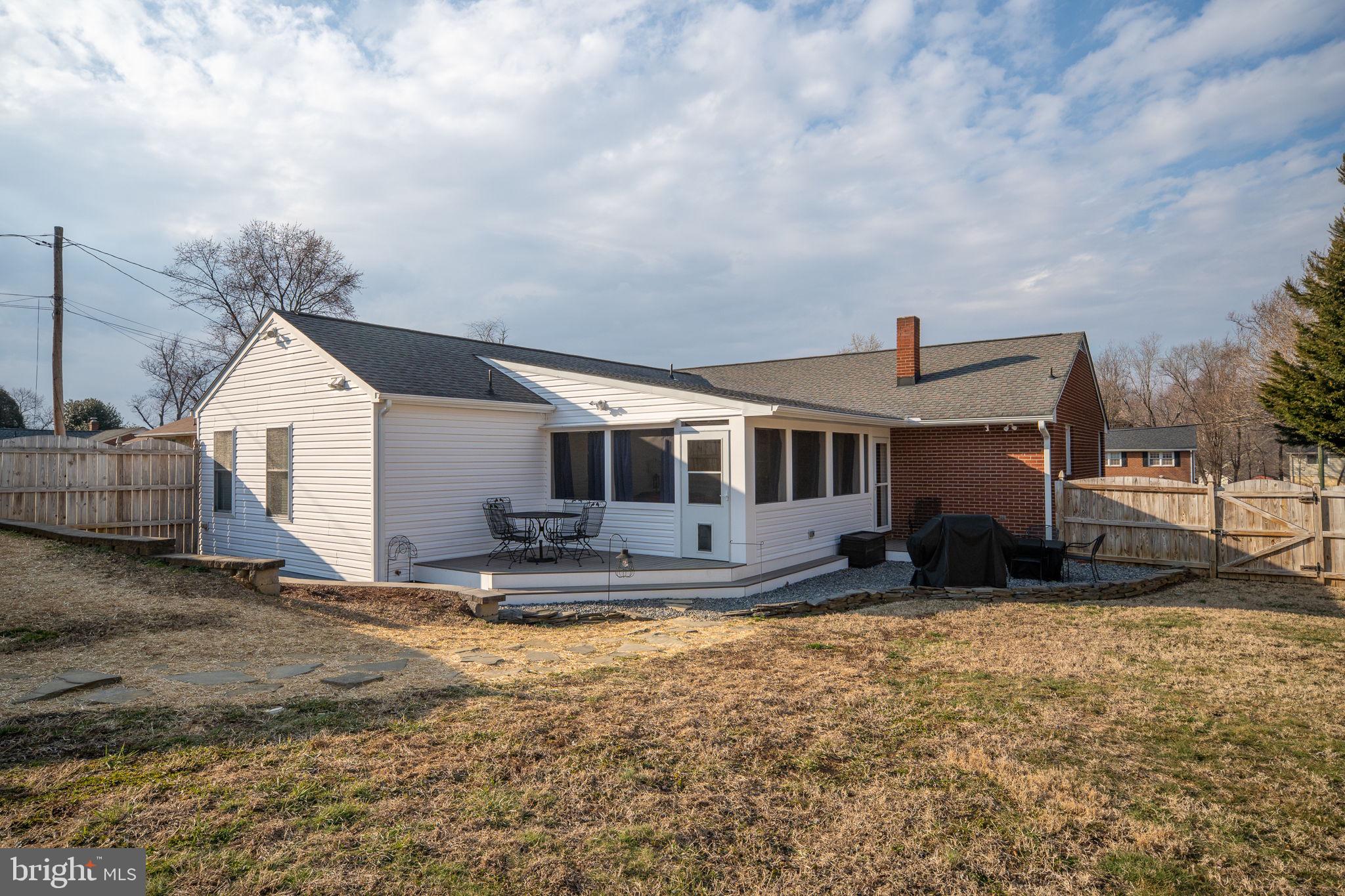 511 Ferry Road Fredericksburg, VA 22405 - Photo 52 of 55 a front view of house with yard outdoor seating and barbeque oven