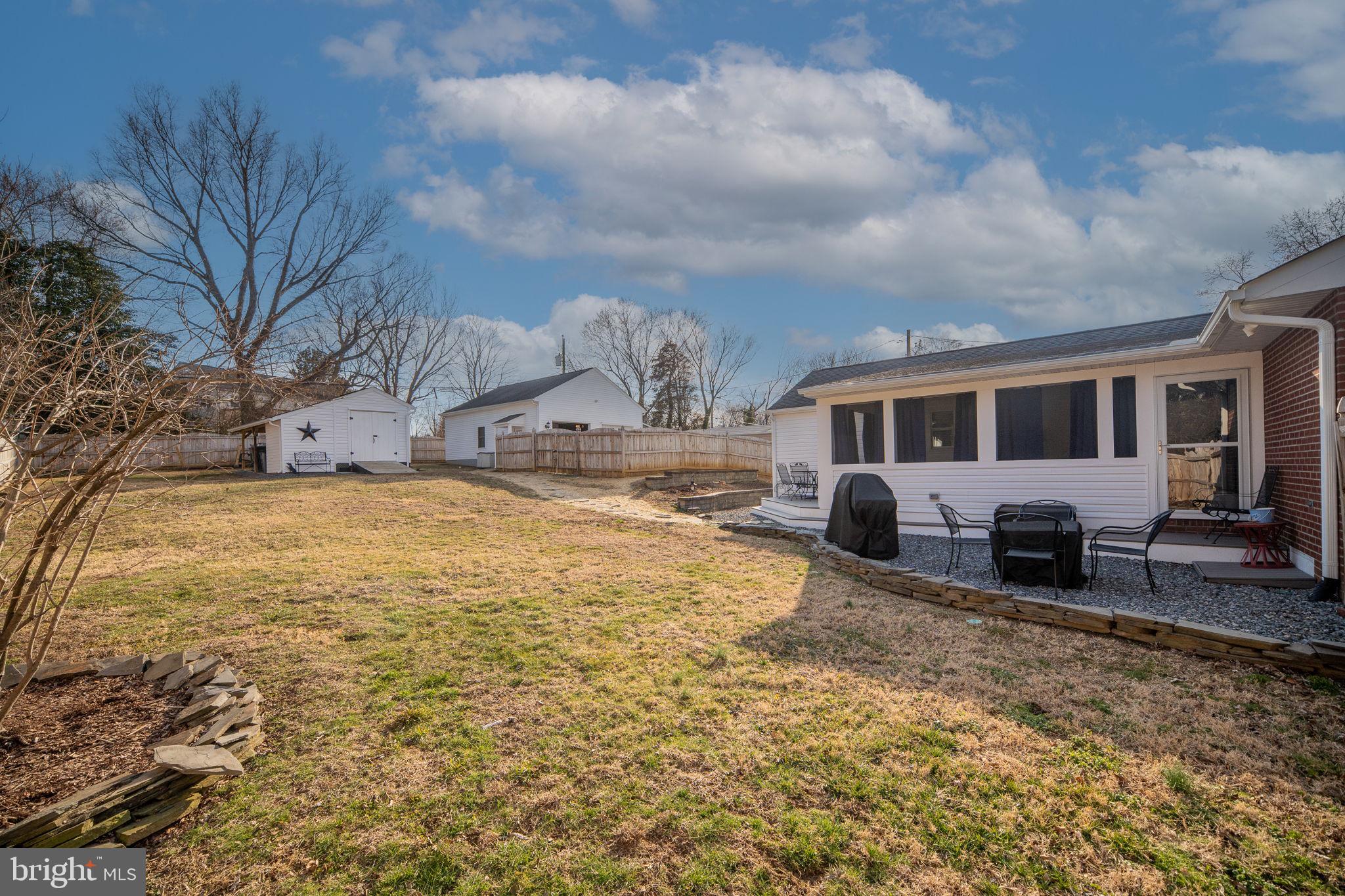 511 Ferry Road Fredericksburg, VA 22405 - Photo 54 of 55 a view of a house with backyard and sitting area