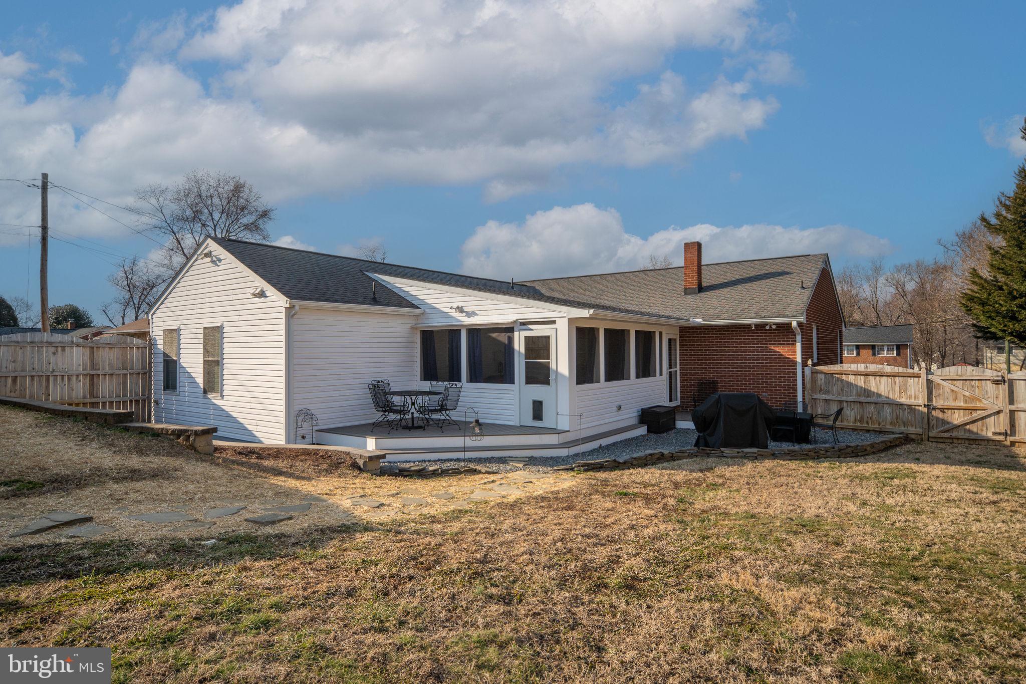 511 Ferry Road Fredericksburg, VA 22405 - Photo 55 of 55 a front view of house with yard outdoor seating and barbeque oven
