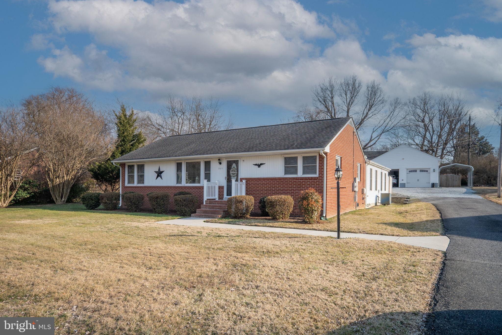 511 Ferry Road Fredericksburg, VA 22405 - Photo 7 of 55 a view of a house with a yard covered in snow