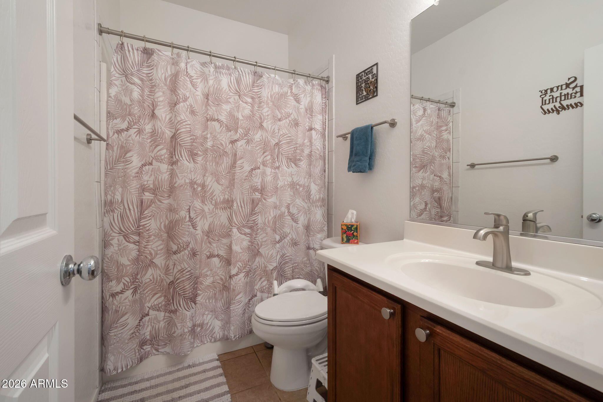 225 West Reeves Avenue Queen Creek, AZ 85140 - Photo 11 of 25 a bathroom with a sink toilet and shower