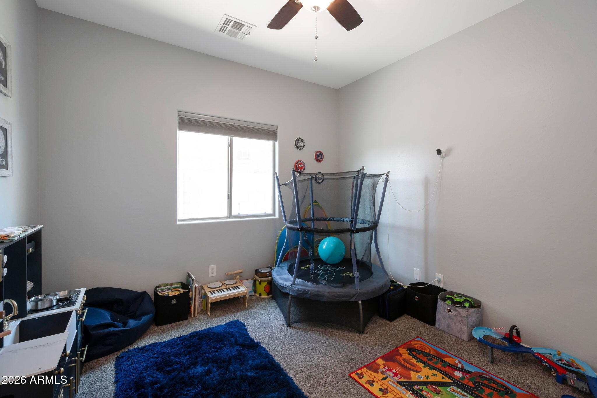 225 West Reeves Avenue Queen Creek, AZ 85140 - Photo 12 of 25 a living room with furniture and a window