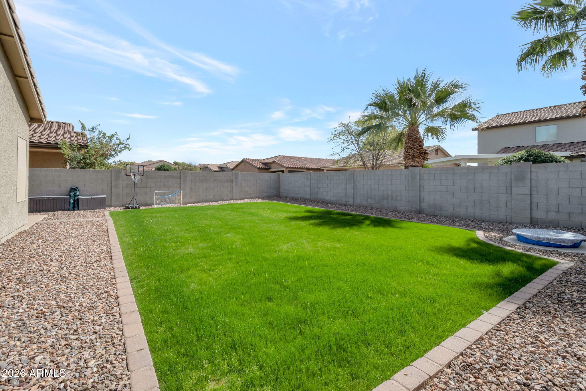 225 West Reeves Avenue Queen Creek, AZ 85140 - Photo 15 of 25 a view of a backyard with a garden