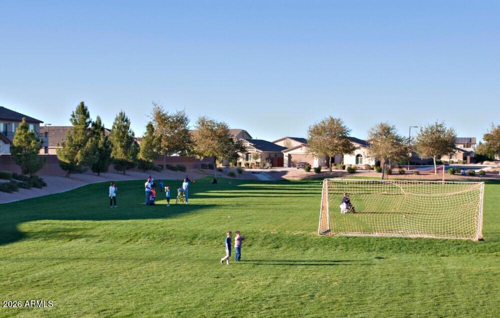 225 West Reeves Avenue Queen Creek, AZ 85140 - Photo 24 of 25 a view of a golf course with a lake