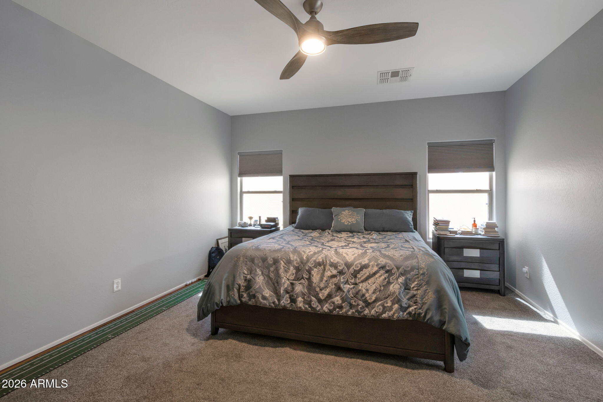 225 West Reeves Avenue Queen Creek, AZ 85140 - Photo 8 of 25 a bedroom with a bed and window