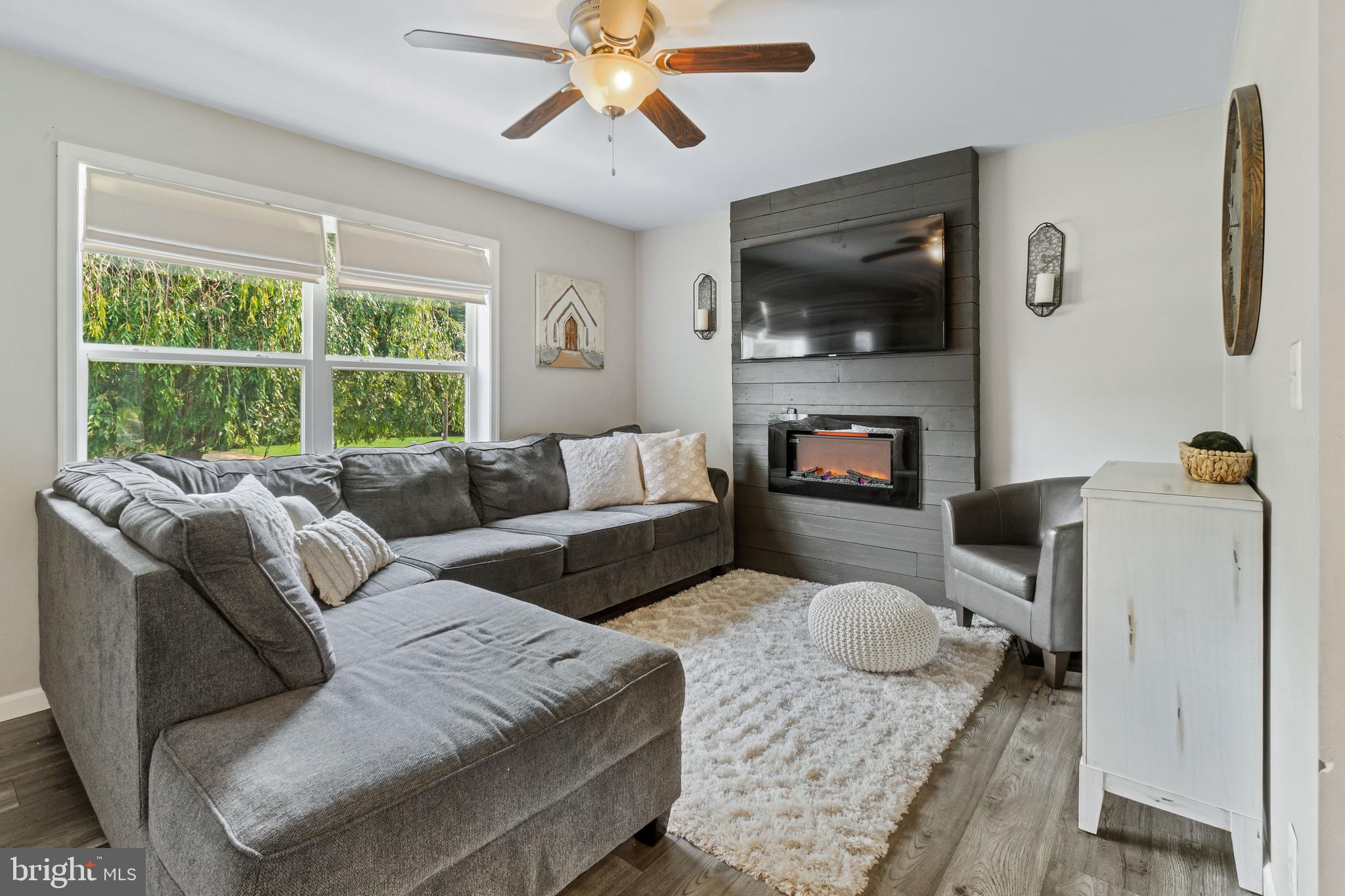 475 Firetower Road Colora, MD 21917 - Photo 3 of 25 LIVING ROOM WITH ELECTRIC FIREPLACE