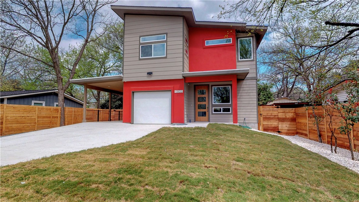 4612 Tanney Street Austin, TX 78721 - Photo 1 of 1 a front view of a house with garden
