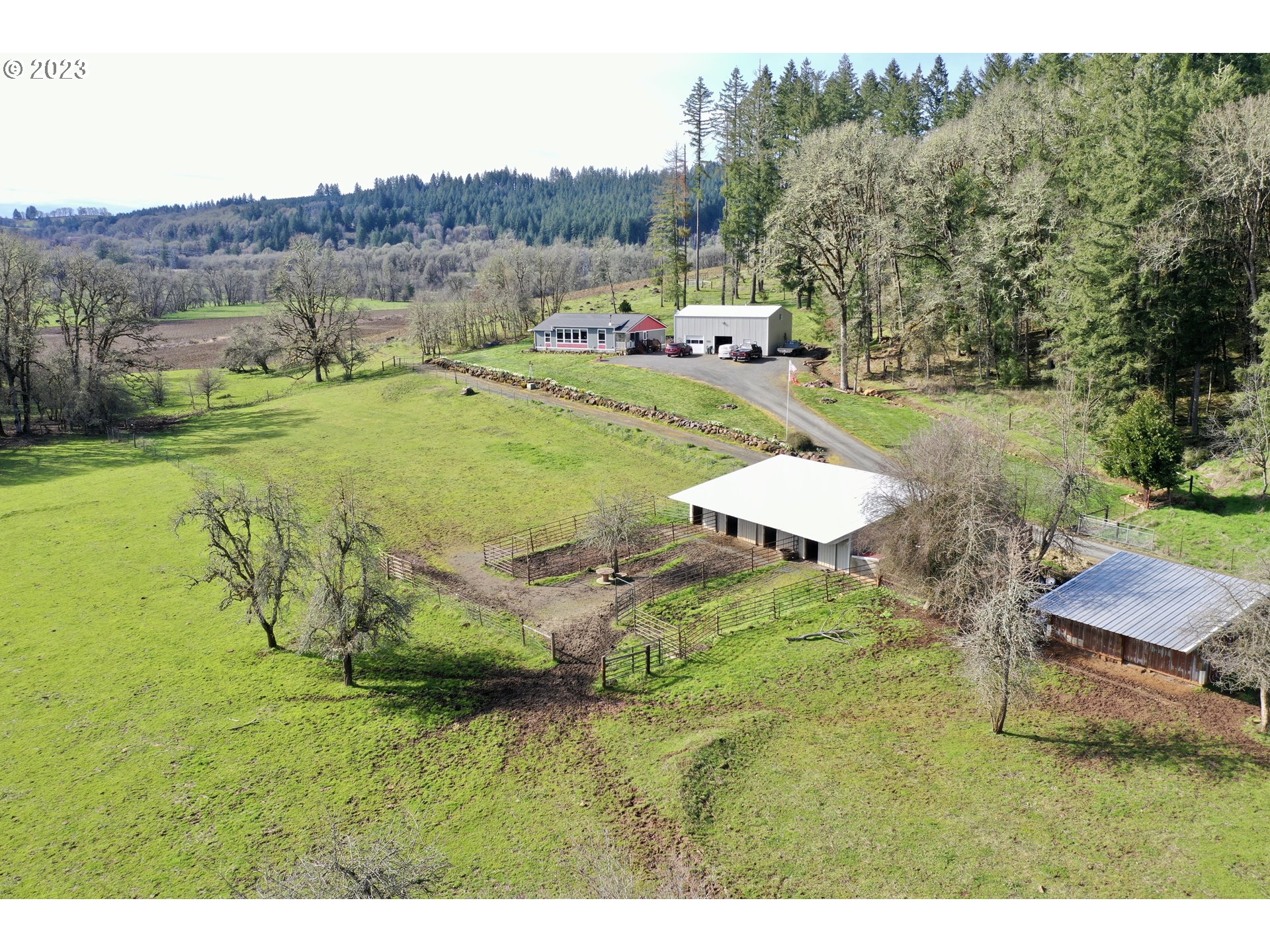 39489 Kingston Jordan Road Scio, OR 97374 - Photo 1 of 47 a view of a swimming pool with a yard