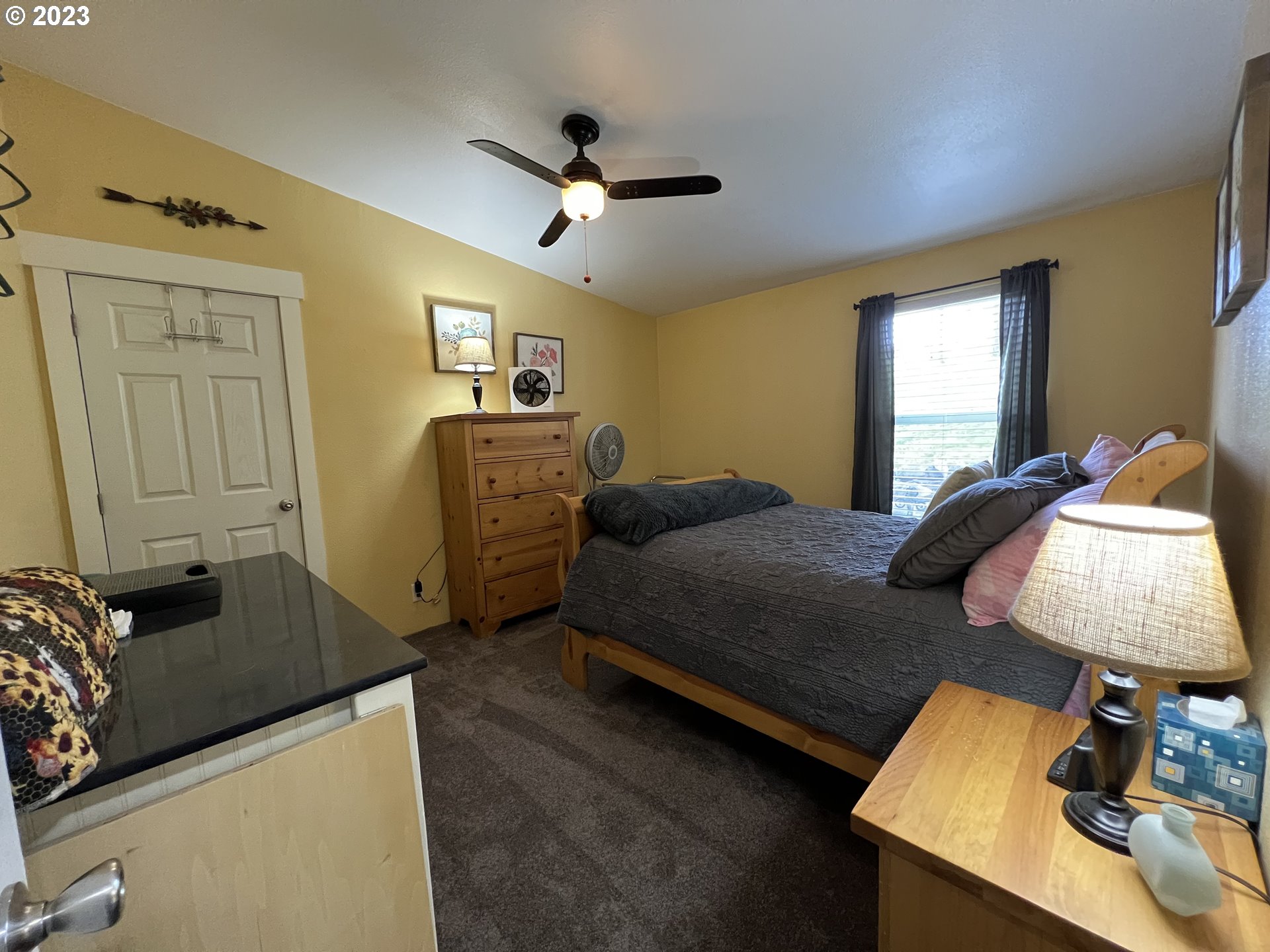 39489 Kingston Jordan Road Scio, OR 97374 - Photo 14 of 47 a bedroom with a bed and a dresser