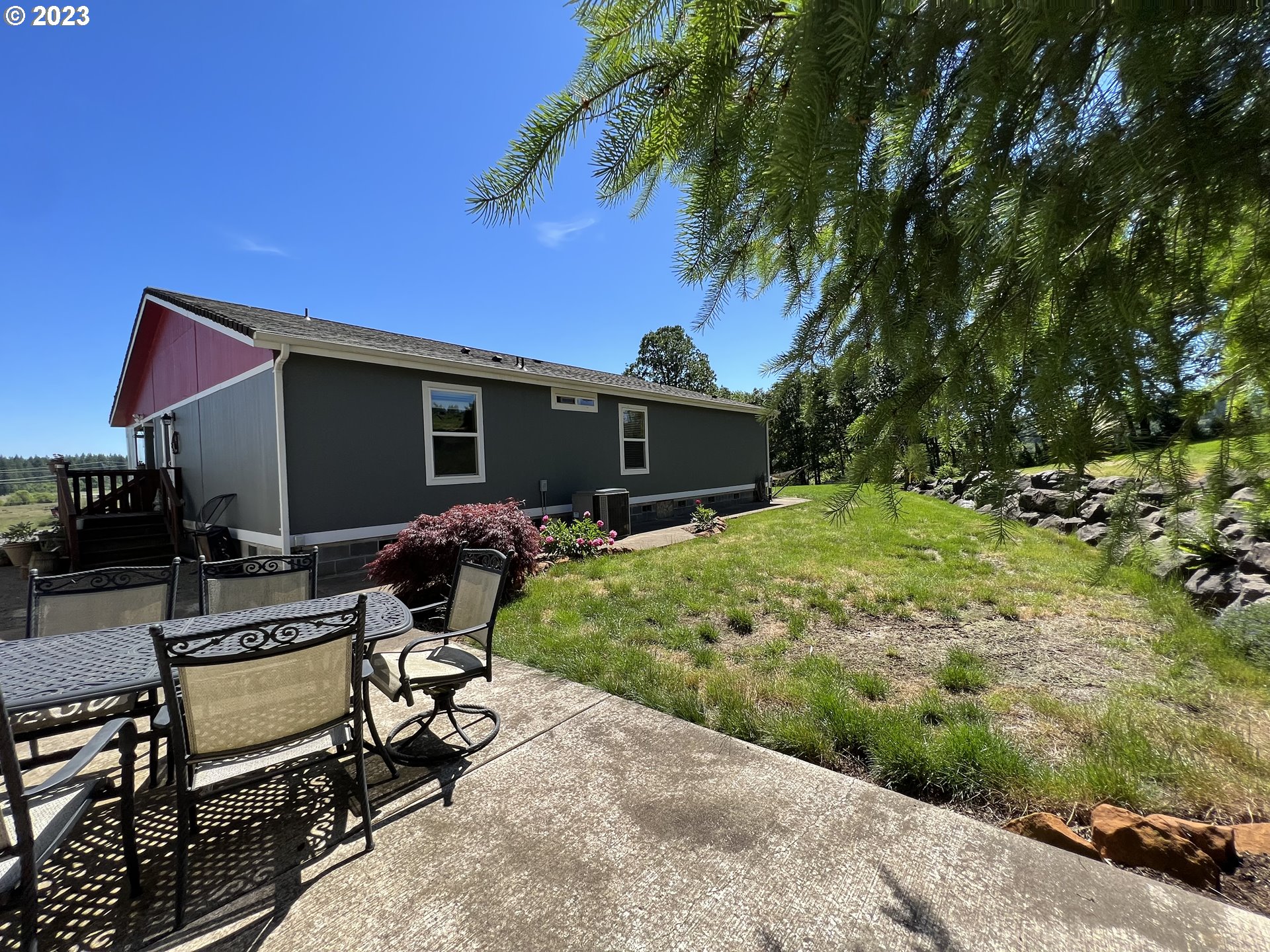 39489 Kingston Jordan Road Scio, OR 97374 - Photo 19 of 47 a view of a backyard with a patio
