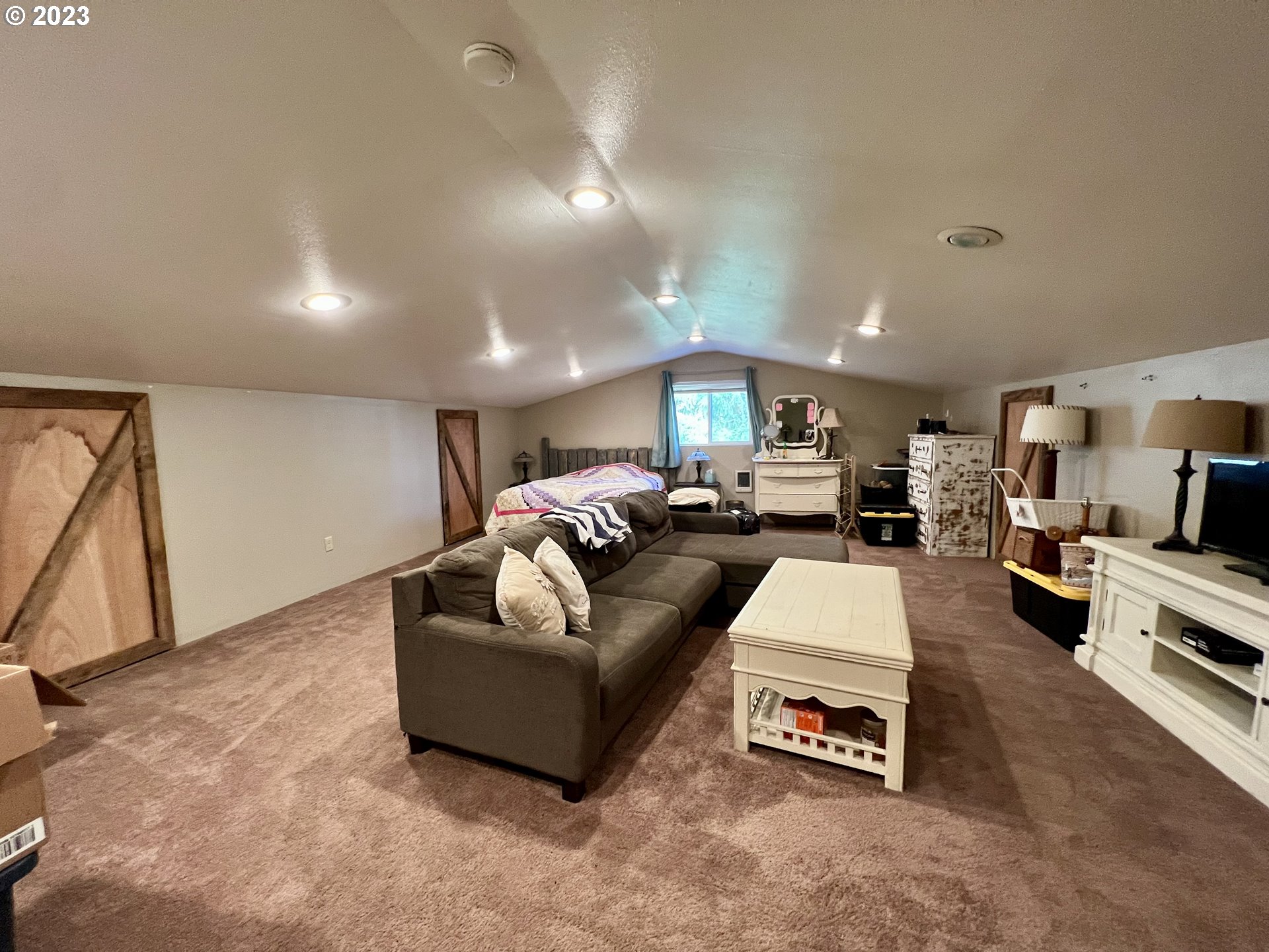 39489 Kingston Jordan Road Scio, OR 97374 - Photo 27 of 47 a living room with furniture and a flat screen tv