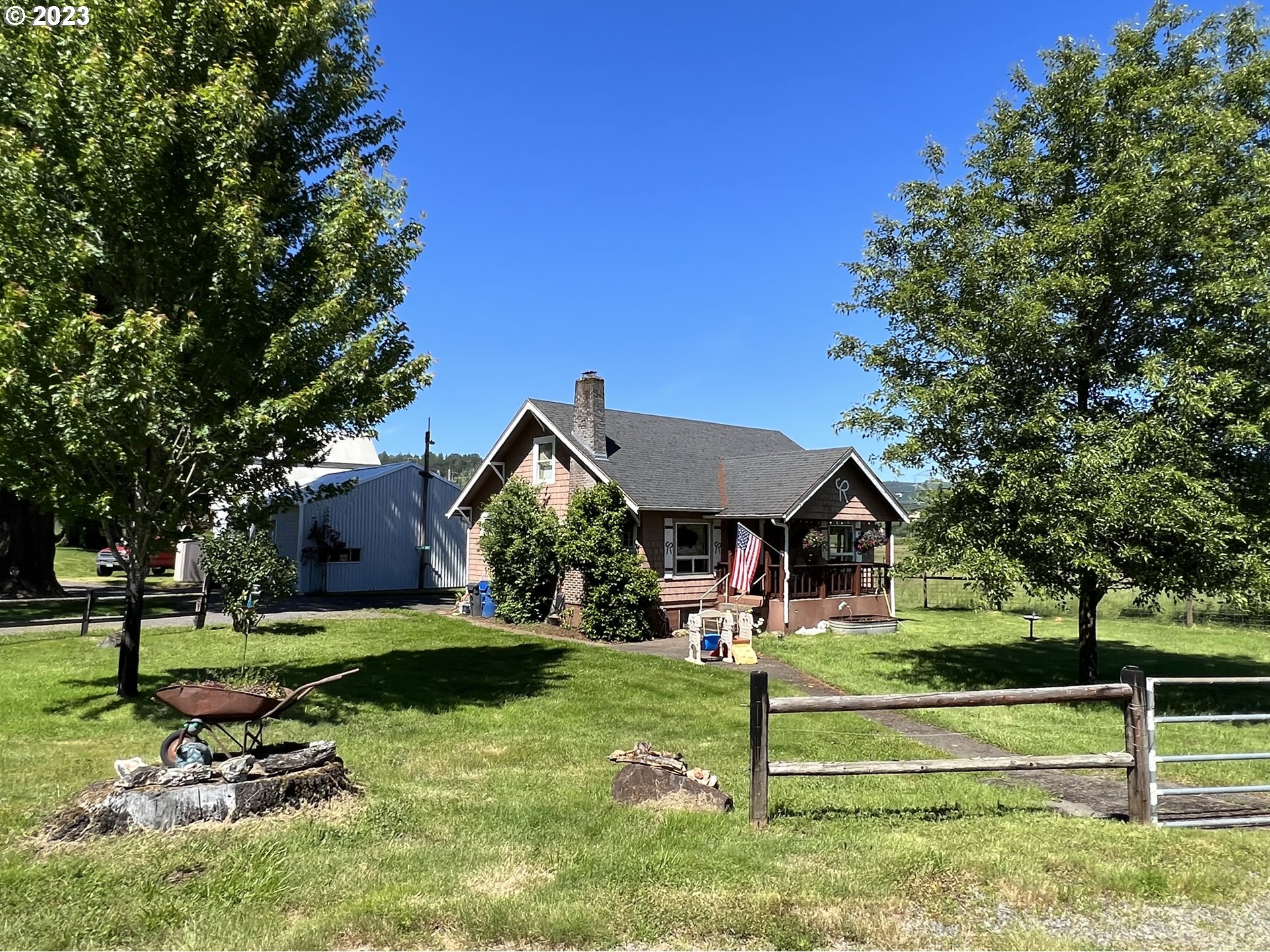 39489 Kingston Jordan Road Scio, OR 97374 - Photo 31 of 47 a view of a house with backyard and sitting area