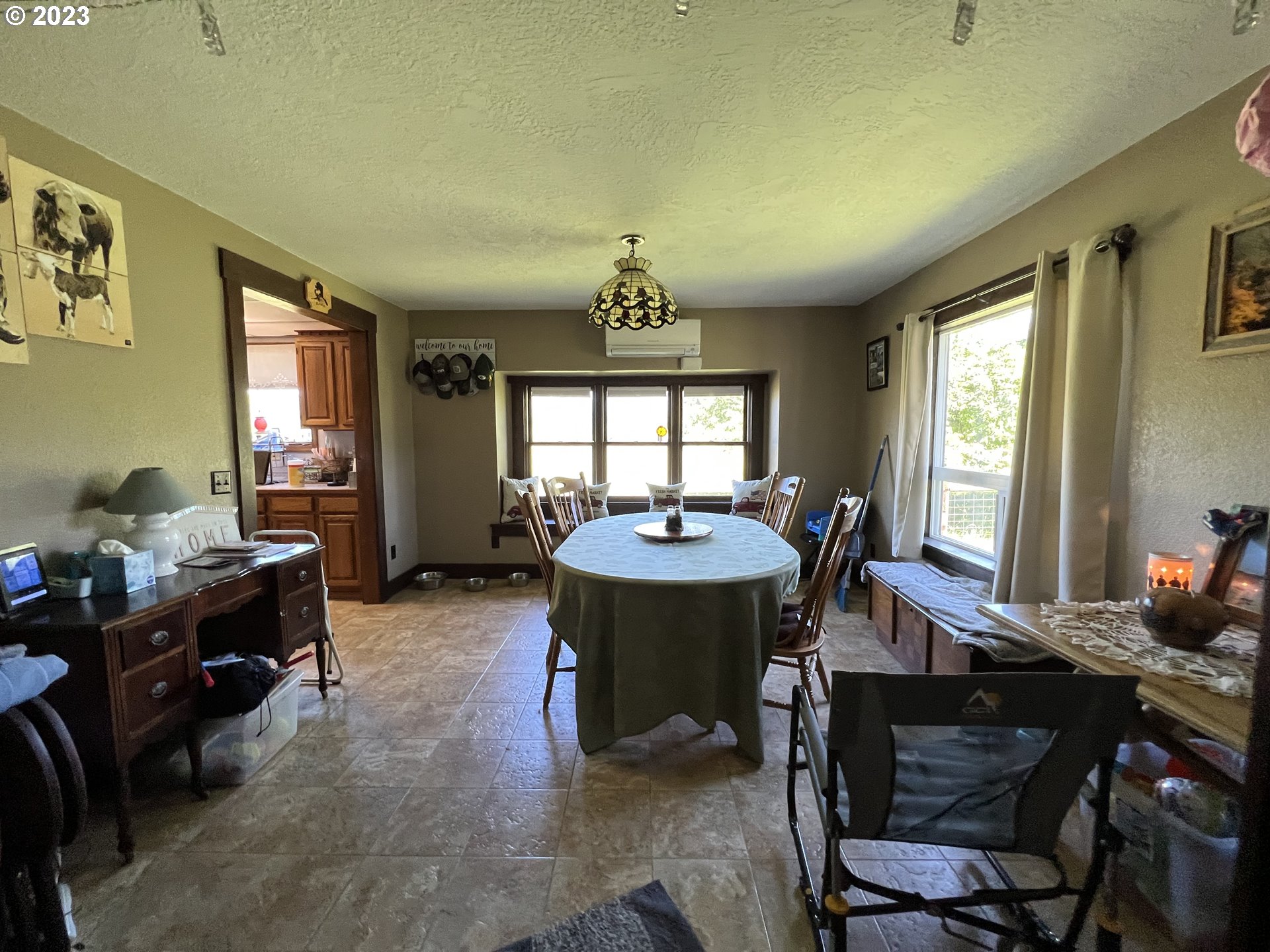 39489 Kingston Jordan Road Scio, OR 97374 - Photo 32 of 47 a view of a dining room with furniture and window