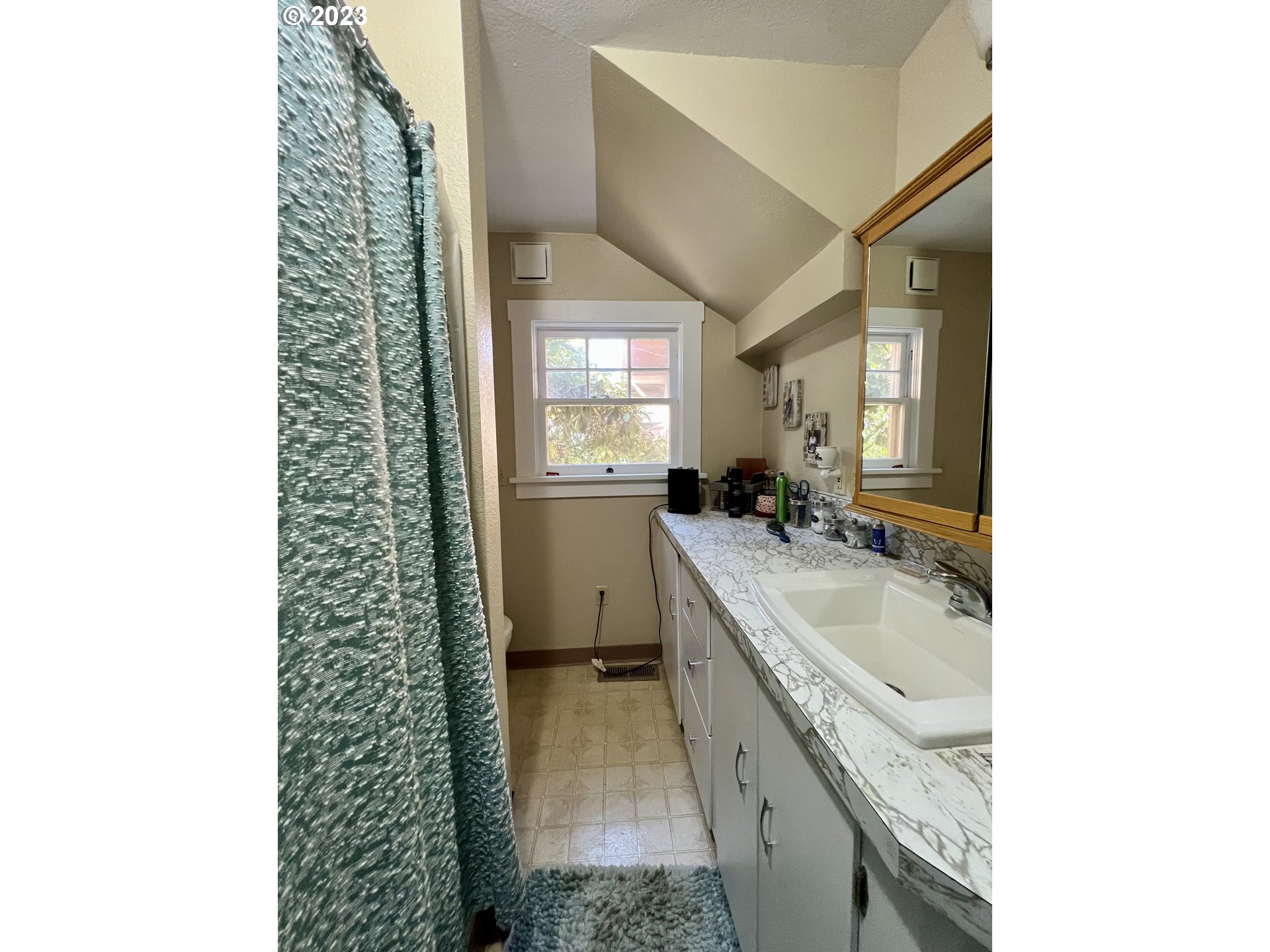 39489 Kingston Jordan Road Scio, OR 97374 - Photo 35 of 47 a bathroom with a granite countertop sink a toilet and a mirror