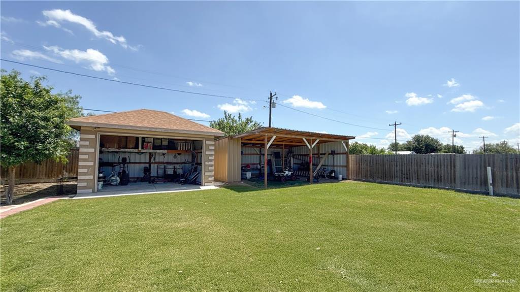 1301 Minnesota Road Pharr, TX 78577 - Photo 17 of 28 a view of a house with a yard and sitting area