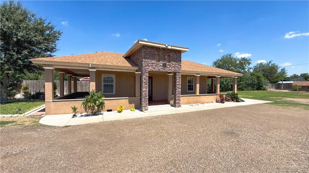 1301 Minnesota Road Pharr, TX 78577 - Photo 18 of 28 a front view of a house with a porch