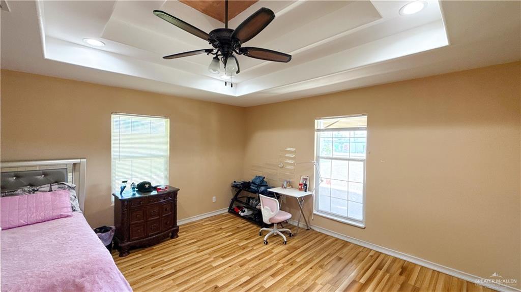 1301 Minnesota Road Pharr, TX 78577 - Photo 22 of 28 a living room with furniture and a window