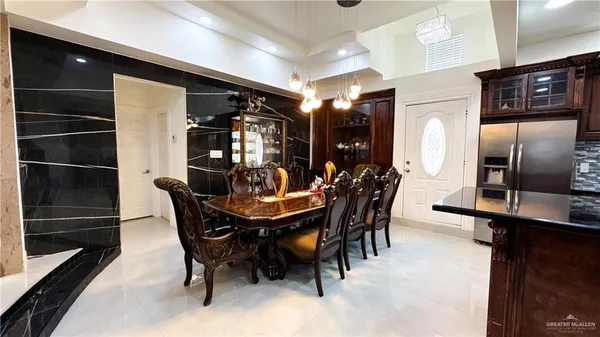 a view of a dining room with furniture