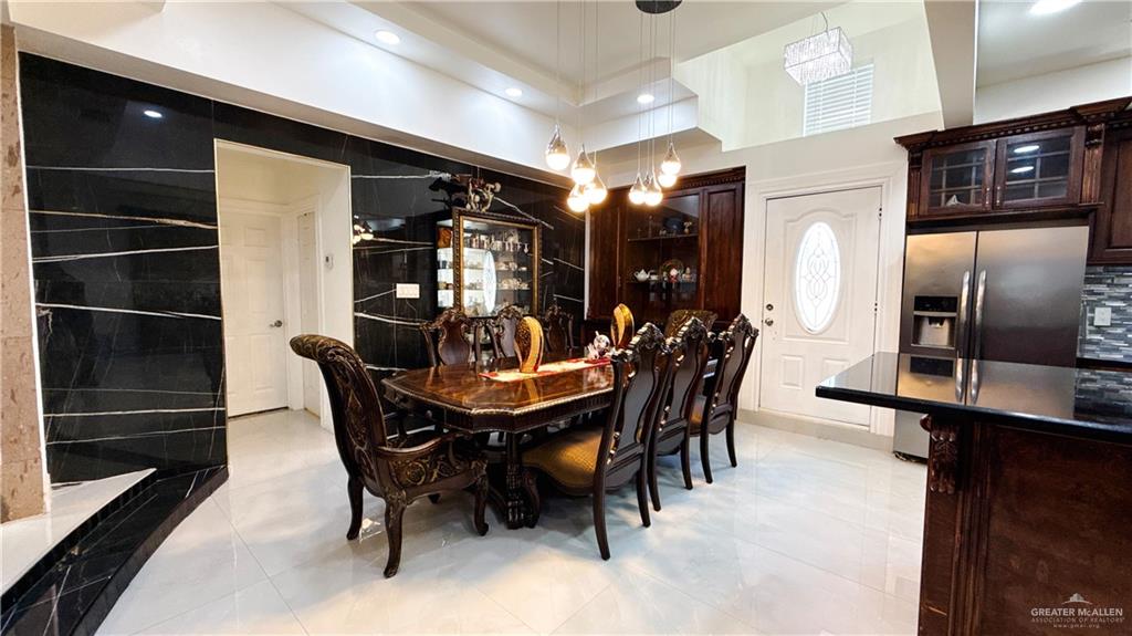 1301 Minnesota Road Pharr, TX 78577 - Photo 5 of 28 a view of a dining room with furniture