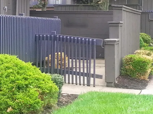 a view of a backyard with a garden