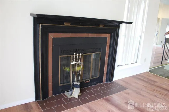 a view of an entryway with a fireplace