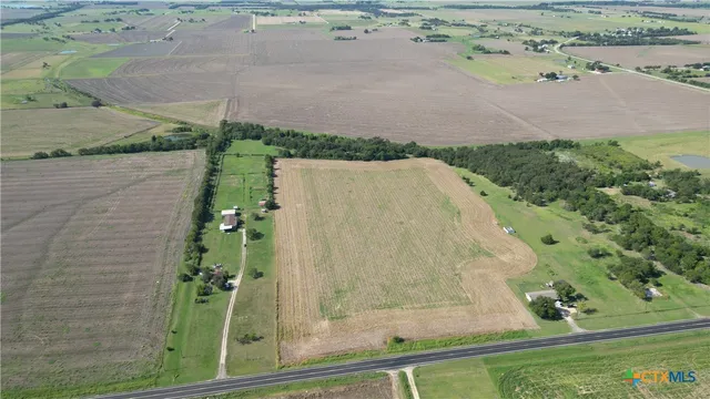 a view of a house with a big yard