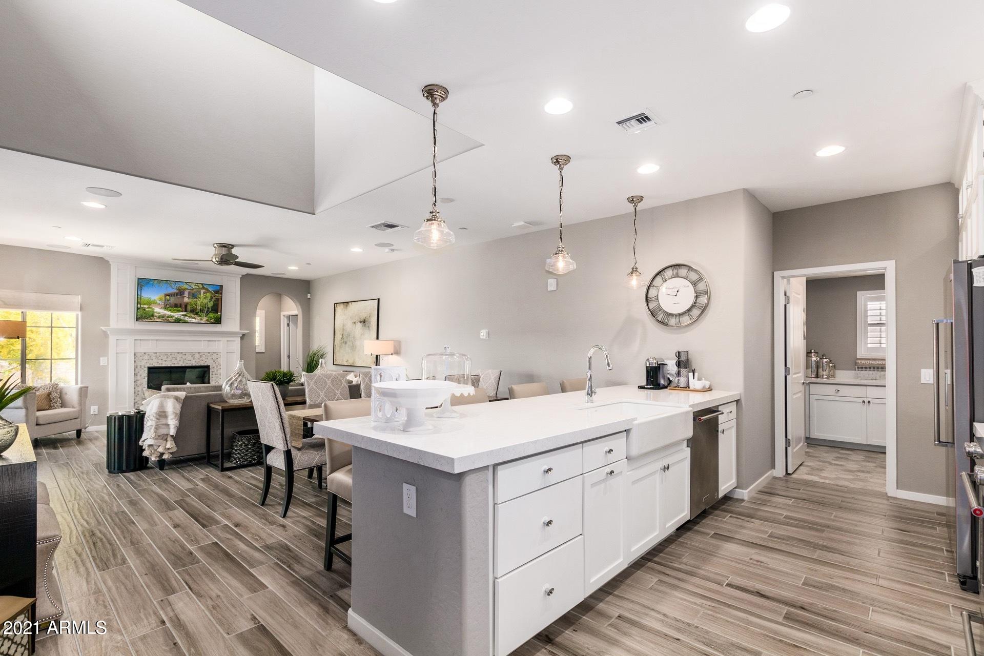 3935 East Rough Rider Road, Unit 1375 Phoenix, AZ 85050 - Photo 1 of 52 Open Kitchen and Living
