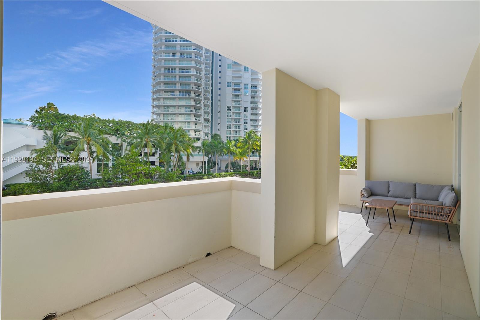 250 Sunny Isles Boulevard, Unit TH207 Sunny Isles Beach, FL 33160 - Photo 11 of 33 a view of outdoor space with seating area