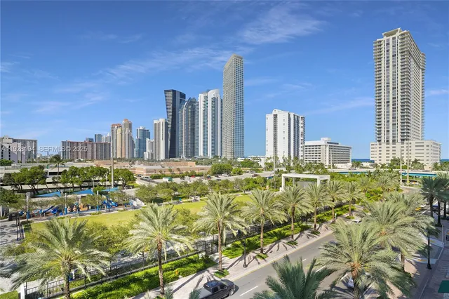 a view of a city with tall buildings