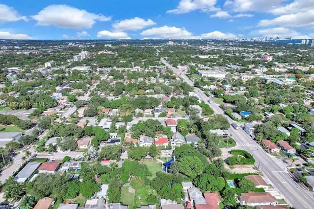 a view of city and green space