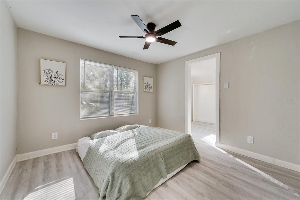 109 Lydia Street Terrell, TX 75160 - Photo 20 of 24 a bedroom with a bed and window