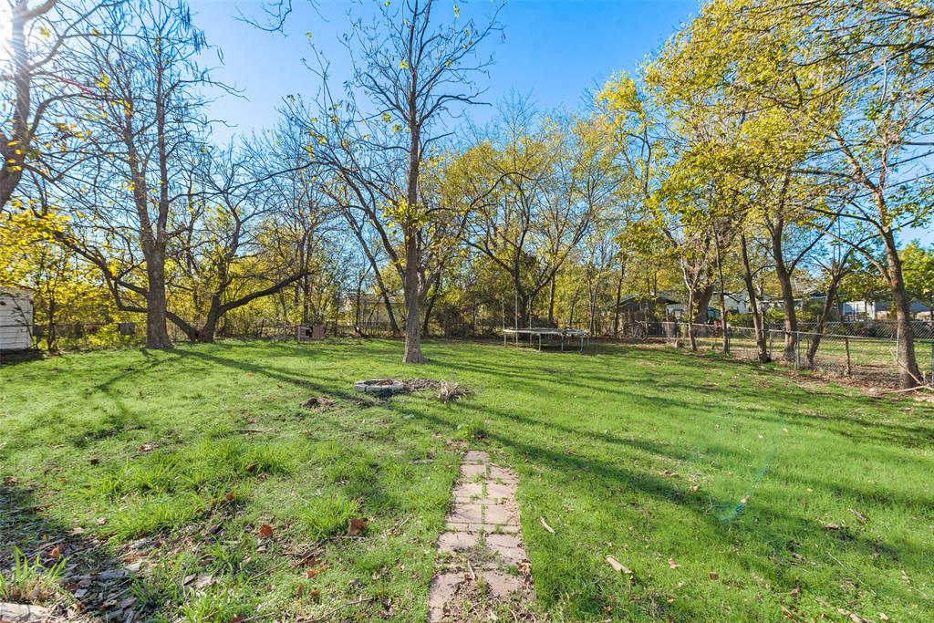 109 Lydia Street Terrell, TX 75160 - Photo 22 of 24 a view of a park with large trees