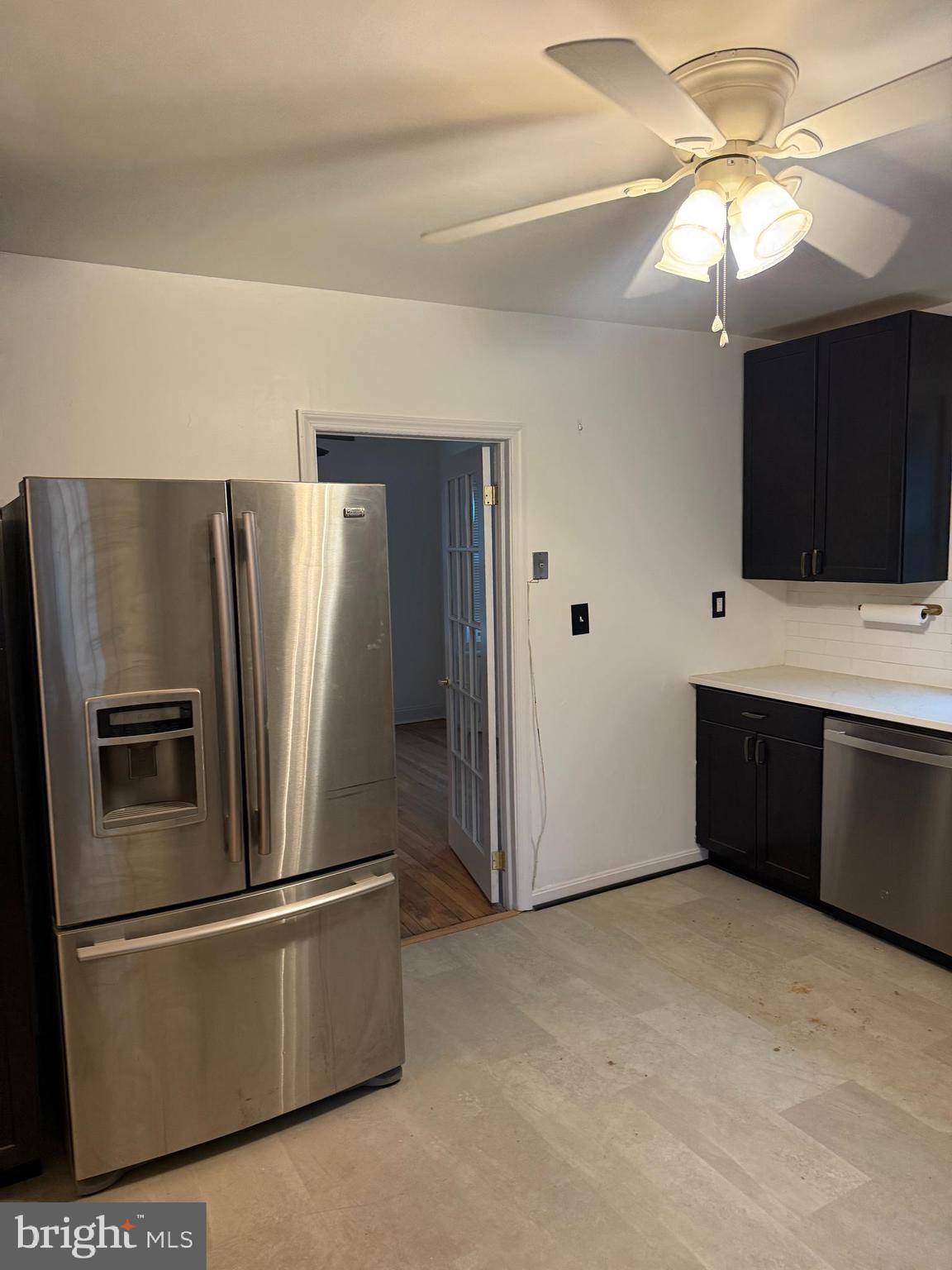 2211 32nd Place Southeast Washington, DC 20020 - Photo 23 of 24 a kitchen with stainless steel appliances a refrigerator a stove a microwave oven with a sink and dishwasher