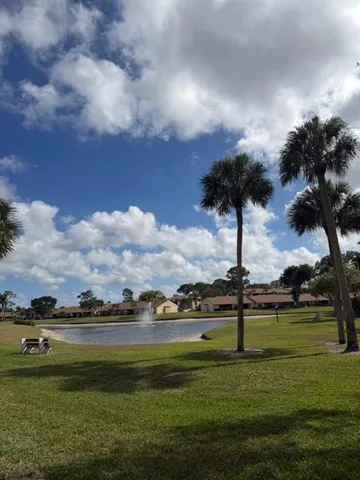 a view of a lake with a big yard