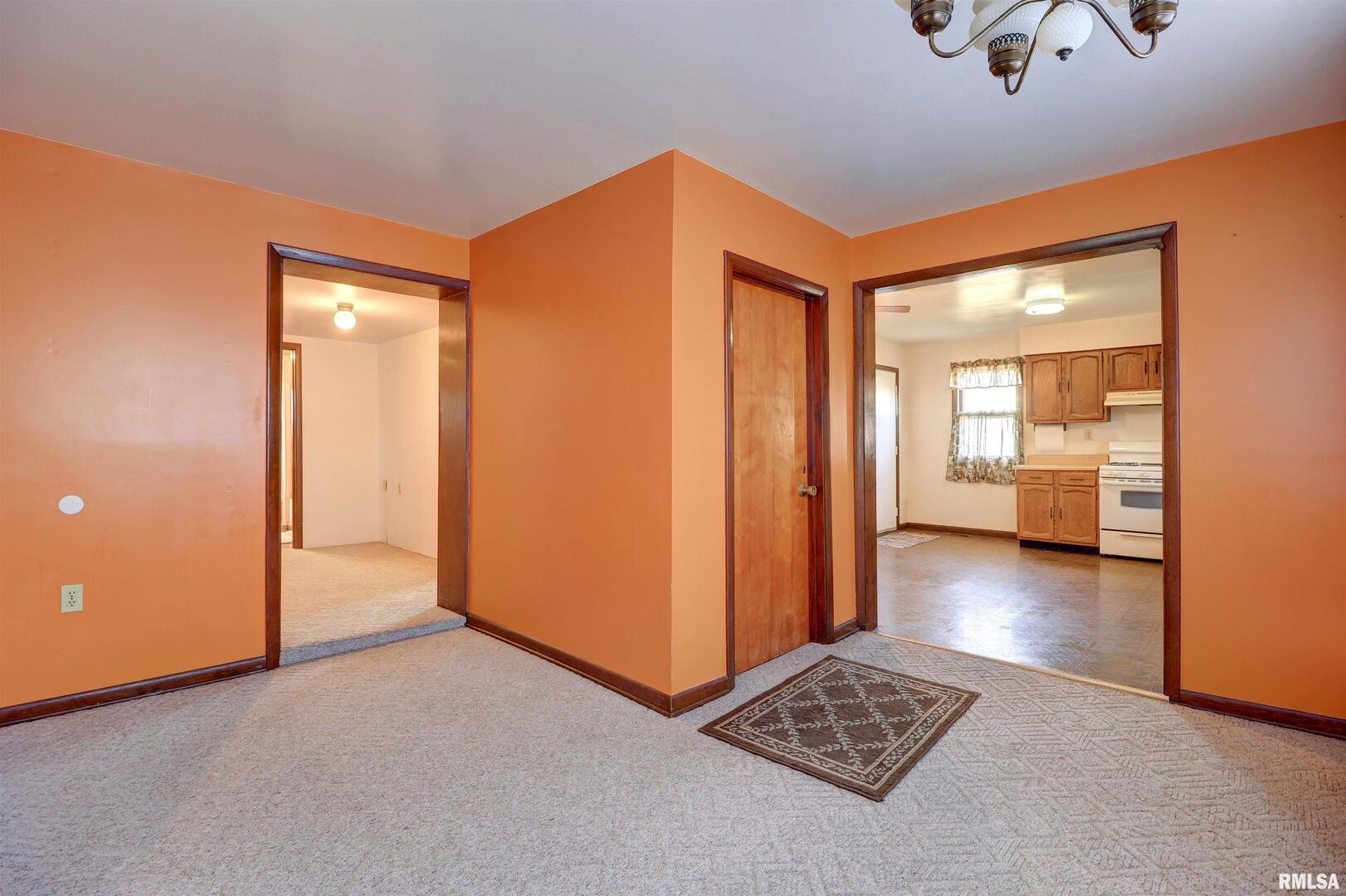 2002 Garfield Street Clinton, IA 52732 - Photo 5 of 19 a view of livingroom with furniture and hardwood floor